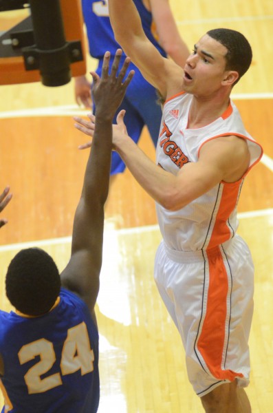 Jeremy David follows through on a shot attempt for the Tigers.