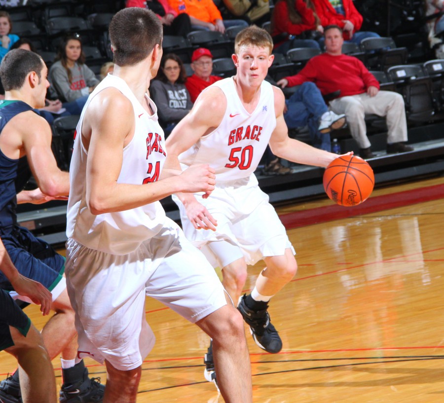 Grace College sophomore Erik Bowen makes a move in the regular-season finale Feb. 20. Bowen and the Lancers will play at Goshen College Wednesday night in a quarterfinal game of the Crossroads League Tournament (Photo provided by the Grace College Sports Information Department)