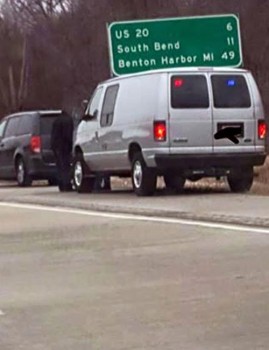 A widely-circulated Facebook photo shows a state trooper assisting a motorist. (Photo provided)