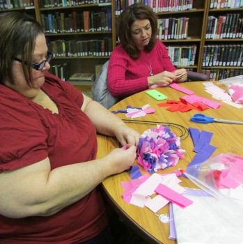 Shari Lambert and Shantel Keith work on their Heart Wreath at our latest adult craft night. Everyone had a great time and the wreaths were beautiful. Monday, March 14, is March's adult craft night. We will be making a muffin basket.