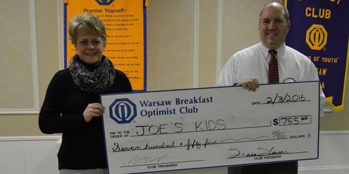 Pictured from left to right are Rebecca Bazzoni, Joe's Kids, and Scott Reust, Warsaw Breakfast Optimist Club.