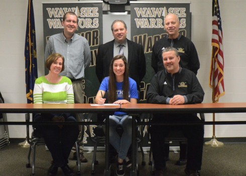 Pictured are, in front from left, Lori Lancaster, Sarah Lancaster and Scott Lancaster. In the back, WHS head coach Doug Heinisch, WHS principal Mike Schmidt and WHS AD Steve Wiktorowski. (Photo by Nick Goralczyk)