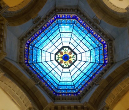 Artificial lights placed behind the Rotunda dome’s stained glass ensure the colors are visible even on cloudy days.