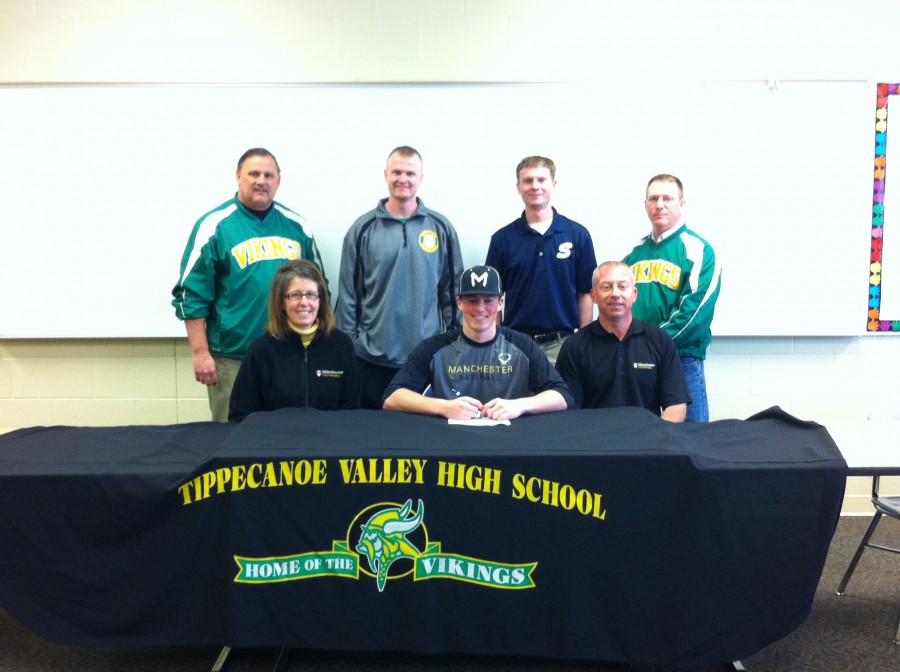 Tippecanoe Valley High School senior Luke Helton signs to play baseball at Manchester University. Helton is flanked by his parents Elizabeth and Michael. In back are Valley AD Duane Burkhart, Valley baseball coach Justin Branock, Summit City Slugger Coach Cameron Branock and Valley assistant AD Scott Smith (Photo provided)
