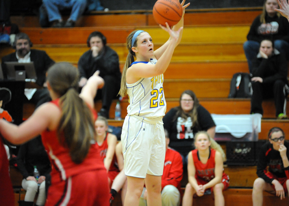 Triton's Nicole Sechrist takes and makes a three-pointer in the first half against North Miami.