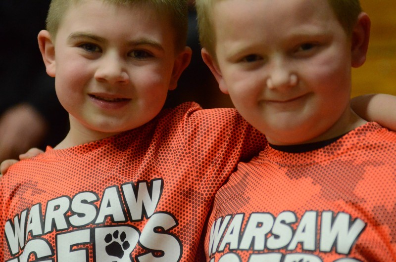 Good riends and huge Warsaw basketball fans Andrew Shaw (left) and Zackary Reneker were all smiles at the sectional final.