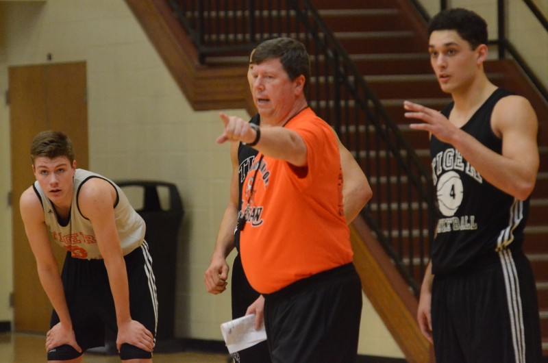 Warsaw boys basketball coach Doug Ogle gives instructions during practice Wednesday. The No. 5 Tigers face South Bend Riley Saturday in the Class 4-A Michigan City Regional.