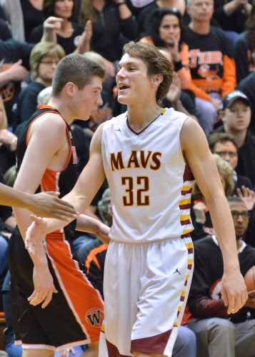 Haden Deaton gets some love from his teammates during the first half of McCutcheon's semi-state win over Warsaw. (Photos by Nick Goralczyk)