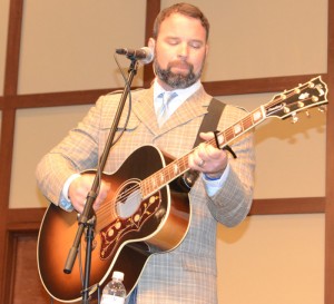 Hunter Smith shares a few of his songs with the guests at the Kosciusko Community YMCA Good Friday Breakfast.