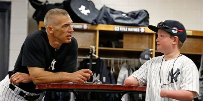 Girardi called Sims an inspiration. "People can overcome extraordinary circumstances," the Yankees skipper said