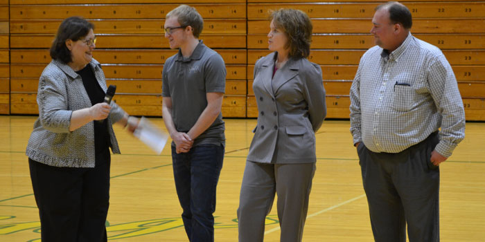 Pictured from left are Kosciusko County Community Foundation executive director Suzie Light, Lilly Scholarship recipient Shay Merley, Angie Merley and Eric Merley. (Photo by Amanda McFarland)