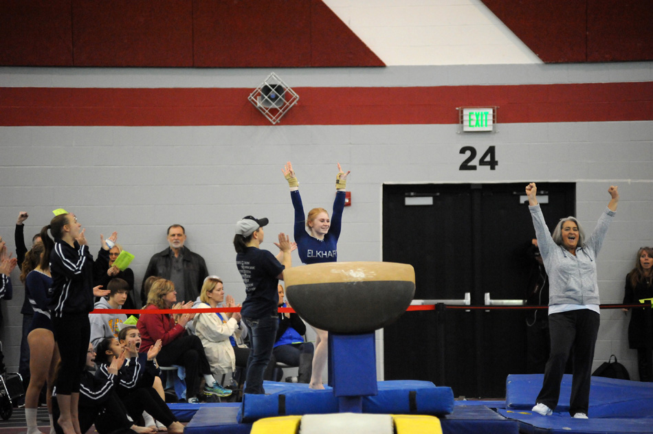 Elkhart Central's Abi Downs completes her first vault pass during the Huntington North Gymnastics Regional.
