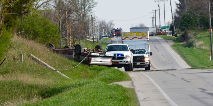 The pick-up truck and downed power line.