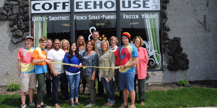 Pictured in front from left are, representing The River Coffeehouse, Silas Hunter, Kyle Babb, board member Brandon Bohnke, Andrea Diaz, Kelly Thompson, board member Tammy Cotton, and Rozzen Kunkle. In back are chamber board members Stacey Cox, Susan Stump, Sue Ward, Jeremy Likens, Helen Leinbach and Martha Stoelting. Not pictured are board members Amelia Allen, Scott Lutz and Amy Eikenberry. (Photo provided)