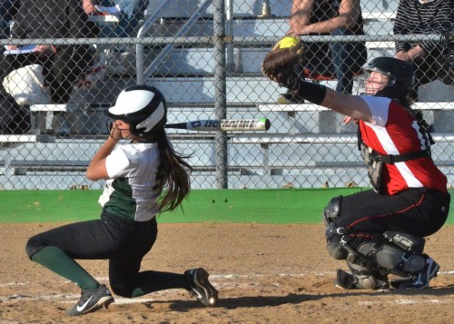 Cristina DeLaFuente ducks to avoid a ball during her at-bat in the sixth inning. 