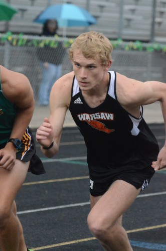 Senior star Owen Glogovsky won both the 1,600 and 3,200 events for the Tigers.