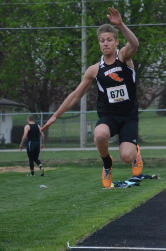 Tristan Larsh competes in the long jump for Warsaw.