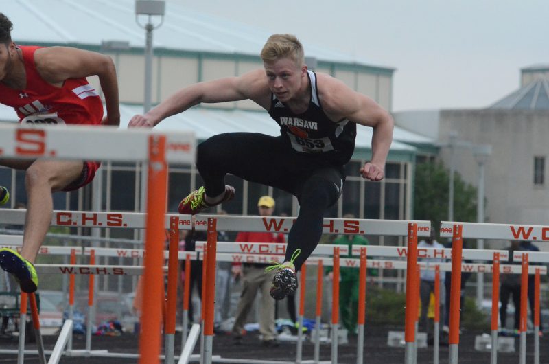 Ross Armey competes in the 110 hurdles for the Tigers Friday night in the Max Truex Invitational at WCHS.