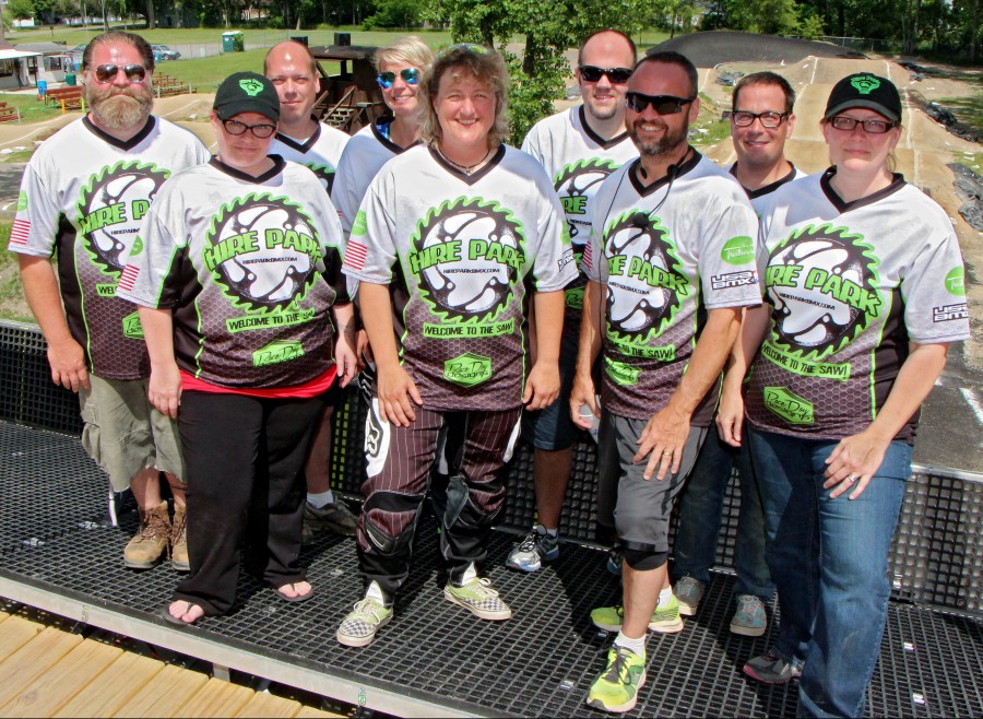 A group of volunteers stand in front of the track they service. Their dedication and hard work is what keeps Hire Park a place BMX riders love to come back to. In the front row, from the left, are Jen Hart, Michelle Marqui, Dan Rumple and Lindsey Brander. In the back row are Andy Hart, Joel Vorndran, Liza Arnold, John Brander, and Jason Coleman.