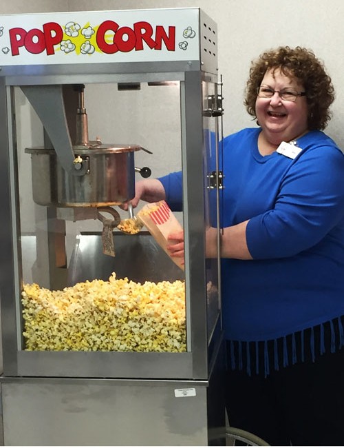 Joni-Brookins-handing-out-popcorn