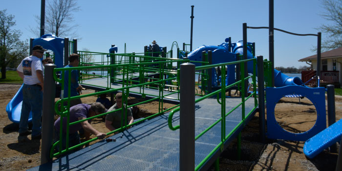 Volunteers continue work on the new Winona Lake Limitless Park project.