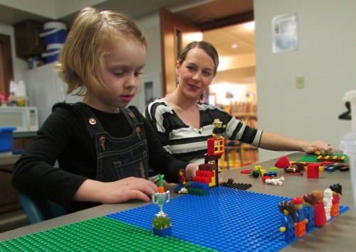 [Photo: Savannah Felegie and Danielle Beer work together to build fun things with LEGOs at our latest LEGO Crew on April 9. Join The Milford Public Library next month, 10:30 a.m. May 14 at the library's next LEGO Crew. 