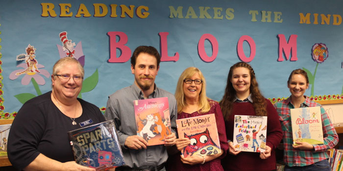 The Syracuse Library is getting ready for summer reading, to make sure that children enjoy reading and like to come to the library. Staff that are shown witlh a good book ar Kim Blaha, Austin Meerzo, Gisela Vore, Kristin Martindale, and Bethany Sizemore.
