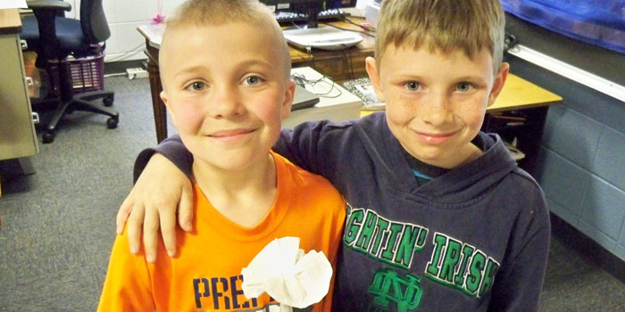Triton Elementary students Nate Schuler and Isaiah Vaca present their finished 'bio-inspired flower.'