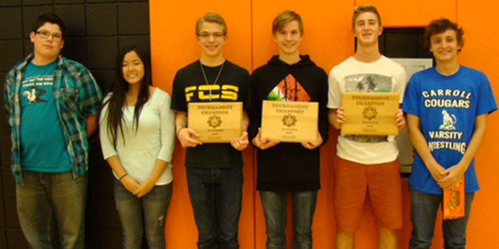 Pictured are WCS students Joel Light, Cole Williamson and Derrick Backus, among students from other participating schools.