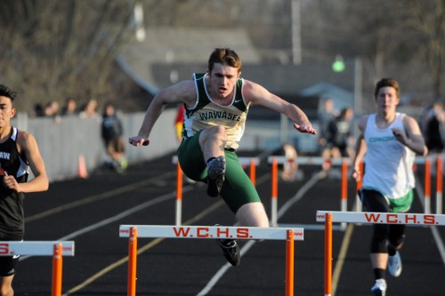Wawasee's David Yankosky takes flight in the 300 hurdles.