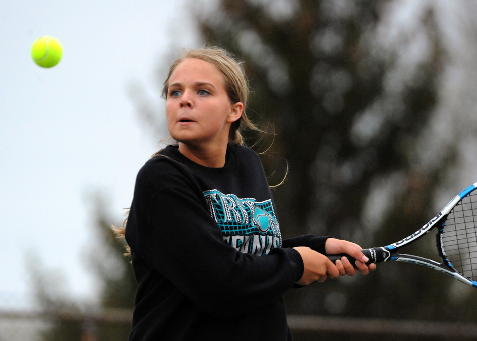 Triton's Kolbie Mason zeroes in on a return against North Judson Wednesday afternoon. (Photos by Mike Deak)