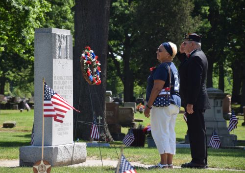 Connie Schlag, auxiliary president, and Commander Dexter Wise presented a wreath on Legion Circle 2 during the memorial service. (Photos by Maggie Kenworthy)