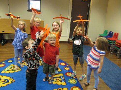 The Syracuse Library has many easy crafts for children to make. Shown is a recent group of children that attended the after school book and craft time. This summer children have star activities with singing, acting and art to investigate their creative side.