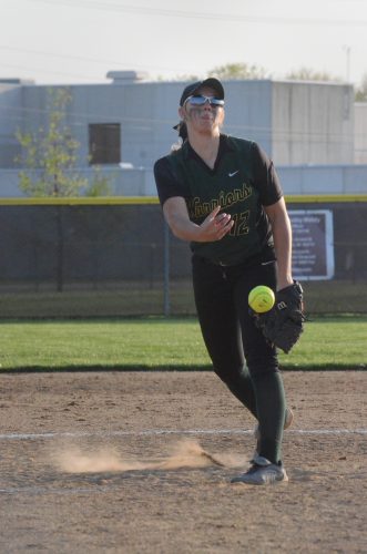 Meghan Frez fires a pitch for Wawasee Friday night. Fretz threw a one-hit gem as the Warriors beat host Elkhart Memorial 14-0 in NLC action.