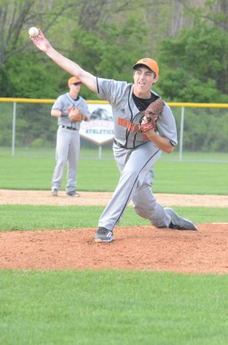 Isaac Lenon fires a pitch for the Tigers.