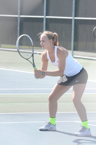Kabrea Rostochak readies for a return in No. 1 doubles play for the Warriors.