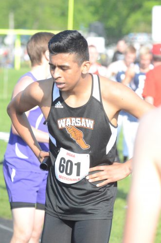 Xavi Ramierez catches his breath after competing in a relay for Warsaw in the Goshen Sectional last wek. The Tigers will host the regional Thursday night.