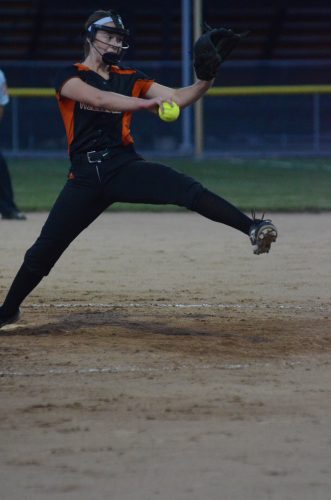 Freshman Courtney Chookie winds up to deliver a pitch for Warsaw in sectional action Tuesday night.
