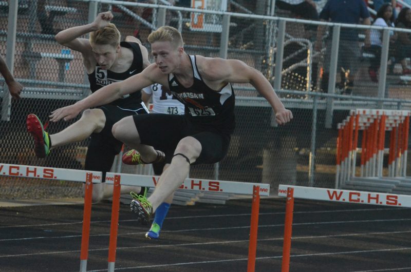 Senior Ross Armey heads to a championship in the 300 hurdles Thursday night. Armey helped the host Tigers claim the regional team title.
