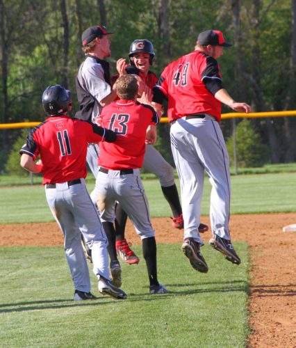 The Grace College baseball team celebrates Tuesday after beating St. Francis 3-2 in its final game of the season (Photo provided by the Grace College Sports Information Department)