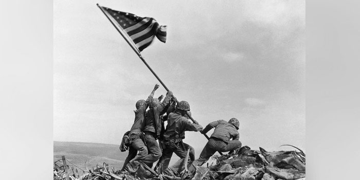 In this Feb. 23, 1945 file photo, U.S. Marines of the 28th Regiment, 5th Division, raise a U.S. flag atop Mount Suribachi, Iwo Jima.