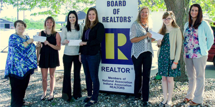 Pictured from left are Nanette DeGaetano, Coldwell Banker Roth Wehrly Graber; Kaci Whitehead, 2016 scholarship winner; Dana Miller, Coldwell Banker Roth Wehrly Graber; Gianna Hochstetler, 2016 scholarship winner; Kim Clark, KBOR board president; Analiese Helms, 2016 scholarship winner; and LeAnne Francis, Mutual Bank. (Photo provided)