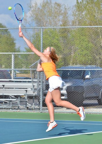 Liza Lewis delivers a serve during Thursday's match with CMA. (Photos by Nick Goralczyk)