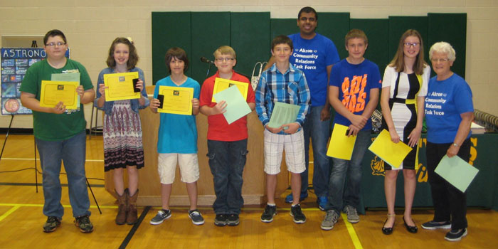 Sixth-grade Peacekeeper award recipients and presenters were, from left, Kyle McVay, Kaydee Shepherd, Drake Montelongo, McKale Litten, Branson McBrier, Juan Baca, Akron Community Relations Task Force, Torren Lewis, Jaeda Carpente and Priscilla Burdge, Akron Community Relations Task Force. (Photos provided)