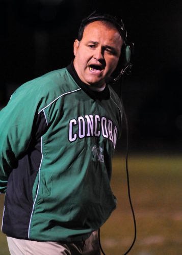 Former Concord High School head football coach Tim Dawson patrols the sidelines, circa 2008. Dawson retired from coaching in 2015. He now serves as sales manager for BBC Distribution in Elkhart. (File photo by Mike Deak)