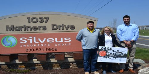 Pictured are Chris McCray from Silveus Insurance Group and member of the CASA Hoopfest committee, Jill Serbousek, CASA board member and Hoopfest committee member, and Tyler Silveus, CEO of Silveus Insurance Group.