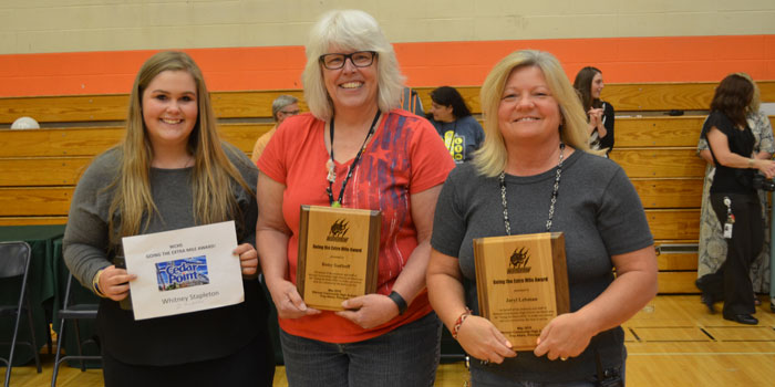 Three people received the Going the Extra Mile award in three categories. They were, from left, Whitney Stapleton in the student category, Betsy Sudhoff in the teacher category and Jeryl Leamon in the support staff category.