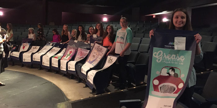 Warsaw elementary-school and high-school art students display the banners they designed for this summer's season at the Wagon Wheel Center for the Arts, Warsaw. (Photo provided)
