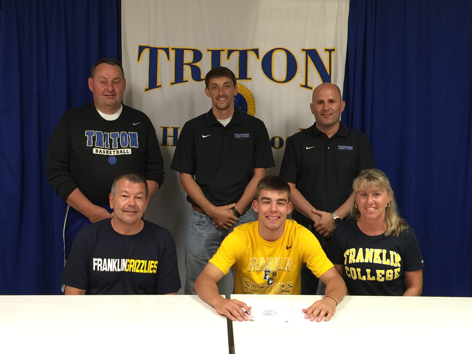 Triton High School's Jordan Anderson has signed a letter of intent to continue his basketball career at Franklin College. Seated with Jordan are parents Greg and Sheila Anderson. In the back row are Triton assistant coach Steve Duff, Triton assistant coach Blake Schori and Triton head coach Jason Groves. (Photos provided)