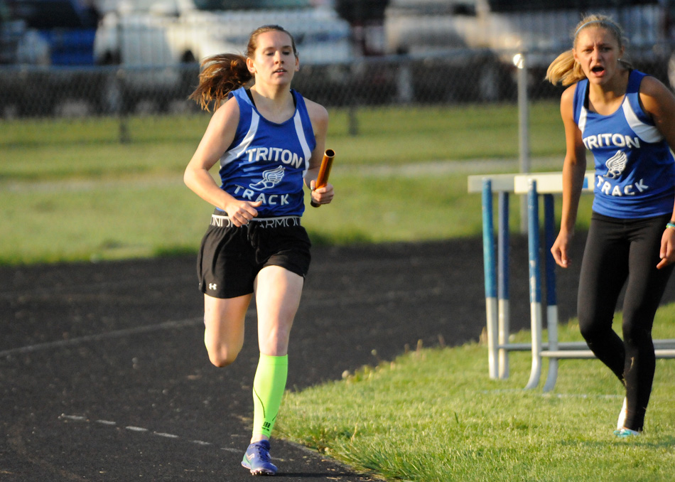 Baylee McIntire, running in the 4x400 relay, and Abigail Powell, right, had huge nights at the HNAC Girls Track Championships Wednesday at Knox. (File photo by Mike Deak)